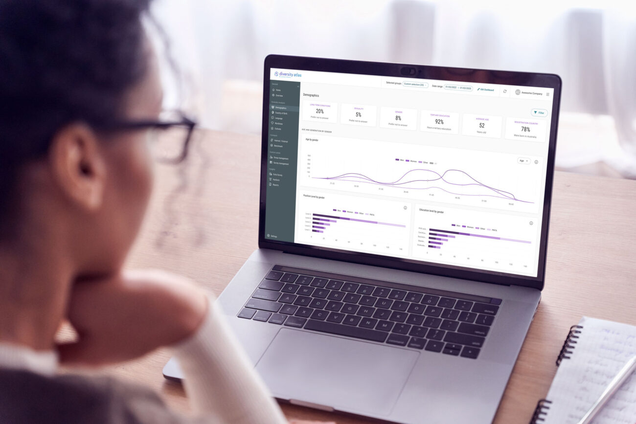 woman looking at dashboard of diversity atlas for schools on laptop